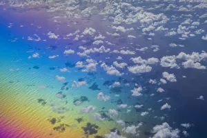 Images Dated 15th February 2017: U. S. Virgin Islands, St. Thomas. Aerial view of clouds and rainbow over the Caribbean Sea