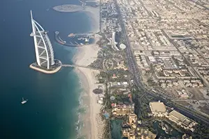 UAE, Dubai. Aerial image of Burj al Arab Hotel and surrounding neighborhood