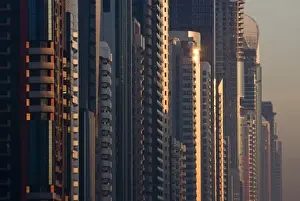 Smog Prints: UAE, Dubai. Close-up of buildings along Sheik Zayed Road at sunrise
