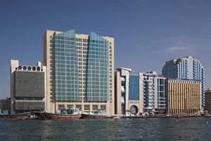 UAE, Dubai, Deira, waterfront buildings by Dubai Creek