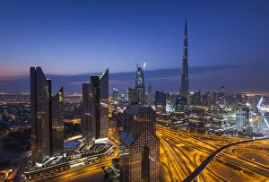 Prints of UAE, Dubai, Downtown Dubai, eleavted view over Sheikh Zayed Road and Burj Khalifa Tower, worlds tallest building, 2016, dawn Images Dated 2018 June: UAE, Dubai, Downtown Dubai, eleavted view over Sheikh Zayed Road and Burj Khalifa Tower
