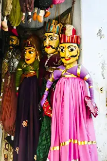 Udaipur Prints: Udaipur, Rajasthan, India. Male and female India toy puppets dressed in traditional
