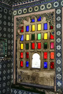 India Gallery: Udaipur, Rajasthan, India. Stain glass window with byzantine tile and scallop arch