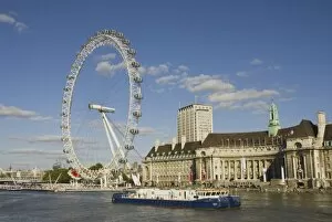 Images Dated 7th October 2006: UK, London. London Eye ferris wheel on the banks of the Thames River