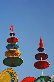 Umbrellas on sign for the Bosang Umbrella festival, Chiang Mai, Thailand