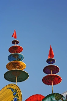 Umbrellas on sign for the Bosang Umbrella festival, Chiang Mai, Thailand
