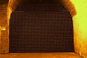 In the underground winecellar that is an old chalk quarry: thousands and millions of bottles aging