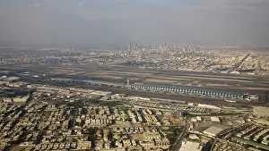 Smog Prints: United Arab Emirates, Dubai. Aerial view of Dubai International Airport and new terminal