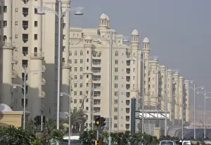 Smog Prints: United Arab Emirates, Dubai. Apartment buildings next to main road in the Palm Jumeirah