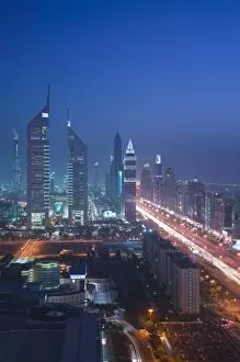 Images Dated 1st March 2007: United Arab Emirates, Dubai, Dubai City. Emirates Towers and Sheikh Zayed Road Highrises