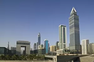 Images Dated 1st March 2007: United Arab Emirates, Dubai, Dubai City. Tower-Up Building and Sheik Zayed Road Highrises
