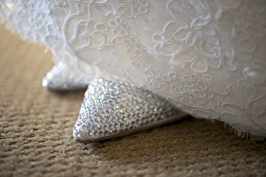 Shoe Prints: United State, USA, New England, Massachusetts, Danvers, close-up of bridal gown and shoes
