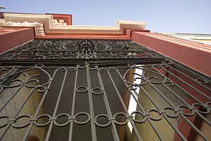 Images Dated 2nd April 2008: United States, Puerto Rico, Ponce. Traditional colonial architecture with wrought-iron gate