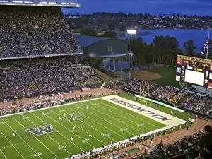 College Prints: University of Washington plays LSU in night college football game in Seattle, WA, USA