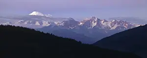 Lee Mann Prints: An unusual view of Mount Baker and the entire Twin Sisters Range in evening light