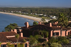 Images Dated 26th February 2009: Uruguay, Maldonado Department, Punta Ballena. Houses above Playa Portezuelo, morning