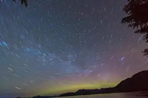Ketchikan Prints: US, AK, Ketchikan. Northern Lights glow on horizon with star trails rotating around North Star