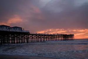 P Ier Prints: US, CA, San Diego. The sun sets over Crystal Pier in San Diego with brilliant clouds overhead