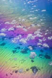 U.S. Virgin Islands, St. Thomas. Aerial view of clouds and rainbow over the Caribbean Sea