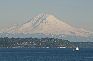 US, WA, Seattle. Volcanic Mt Rainier in Cascades viewed from waters of Puget Sound
