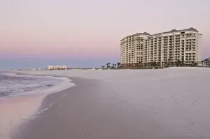 Gulf Prints: USA, AL, Gulf Shores. Pre dawn colors reflected in wet sand in front of Doral high