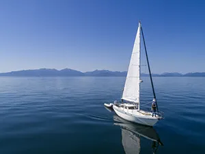 USA, Alaska, Aerial view of Gulf 32 pilothouse boat motoring USA, Alaska, Aerial view of Gulf 32 pilothouse boat motoring