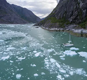 USA, North America, Alaska Prints: USA, Alaska, Aerial views / V Abuelos motoring among icebergs floating near calving face