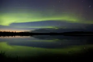 Alaska Prints: USA, Alaska, Bettles. Aurora borealis reflects in Vor Lake Waterlane
