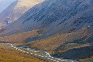 USA, Alaska, Brooks Range. Truck on highway near Atigun Pass