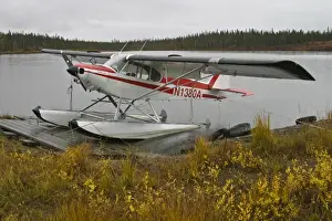 Air Plane Prints: USA. Alaska. A Cessna Super Cub on floats awaits better weather near the Denali Highway