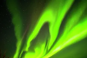 Star Prints: USA, Alaska, Chena Hot Springs Resort. Aurora borealis fills night sky