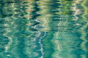 USA, Alaska, Craig. Reflection in rippled water