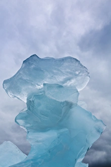 Images Dated 18th July 2012: USA, Alaska, Glacier Bay National Park. Towering ice formation and storm clouds. Credit as