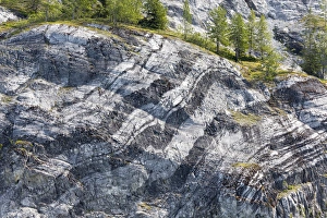 USA, Alaska, Glacier Bay National Park. Layers of striated rock on Gloomy Knob. Credit as