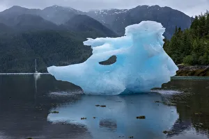 USA, Alaska, Gulf 32 Pilothouse sailboat at anchor near large icebergs from LeConte USA, Alaska, Gulf 32 Pilothouse sailboat at anchor near large icebergs from LeConte