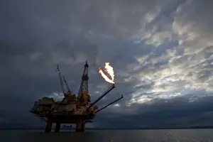 Machinery Prints: USA, Alaska, Kenai Peninsula, Natural gas flare from offshore oil drilling rigs in