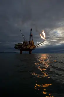 Images Dated 24th June 2008: USA, Alaska, Kenai Peninsula, Natural gas flare from offshore oil drilling rigs in