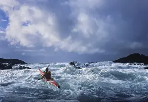 Rough Prints: USA, Alaska. Male sea kayaker in 17 ft confused storm seas off Chichagof Island in SE Alaska