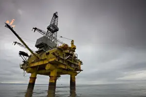 Images Dated 24th June 2008: USA, Alaska, Offshore oil drilling rig in Cook Inlet on summer evening