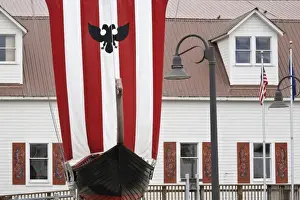 Petersburg Prints: USA, Alaska, Petersburg. A model Viking ship in front of the Sons of Norway Hall