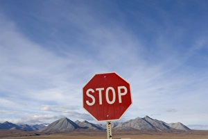 Images Dated 3rd August 2007: USA, Alaska, Stop sign along Dalton Highway in Brooks Range near Atigun Pass