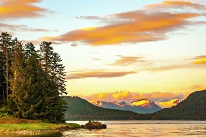 Images Dated 1st June 2023: USA, Alaska, Tongass National Forest. Sunset on Admiralty Island and inlet