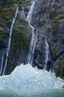 USA, Alaska, Tracy Arm - Fjords Terror Wilderness, Waterfall behind deep blue glacial