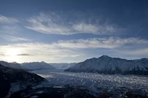USA, Alaska, View from summit of Lions Head peak of morning sun rising over Matanuska Glacier