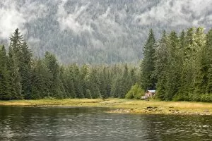 Images Dated 26th August 2008: USA, Alaska, Wrangel. Isolated cabin at edge of forest and lake