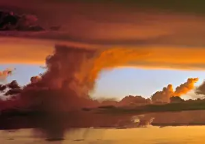 Last Light Prints: USA, Arizona, Grand Canyon NP. Sunset creates vibrant colors in this cloud formation