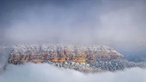 Grand Canyon Prints: USA, Arizona, Grand Canyon. Panoramic of foggy sky over canyon at sunset