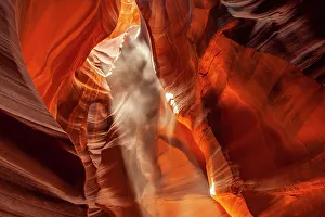Slot Canyon Prints: USA, Arizona, Lake Powell Navajo Tribal Park. Falling dust in Lower Antelope Canyon