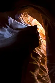 Images Dated 19th September 2008: USA, Arizona, Page. Reflected sunlight creates amber walls in Waterholes or Secret Canyon