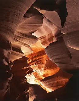 Eroded Prints: USA, Arizona, Page, Sunlight filters down into carved red sandstone walls of Lower